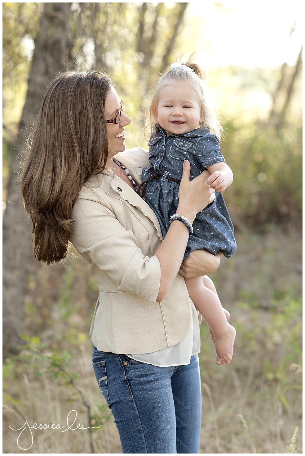 Longmont Family Photographer, smiles with mother