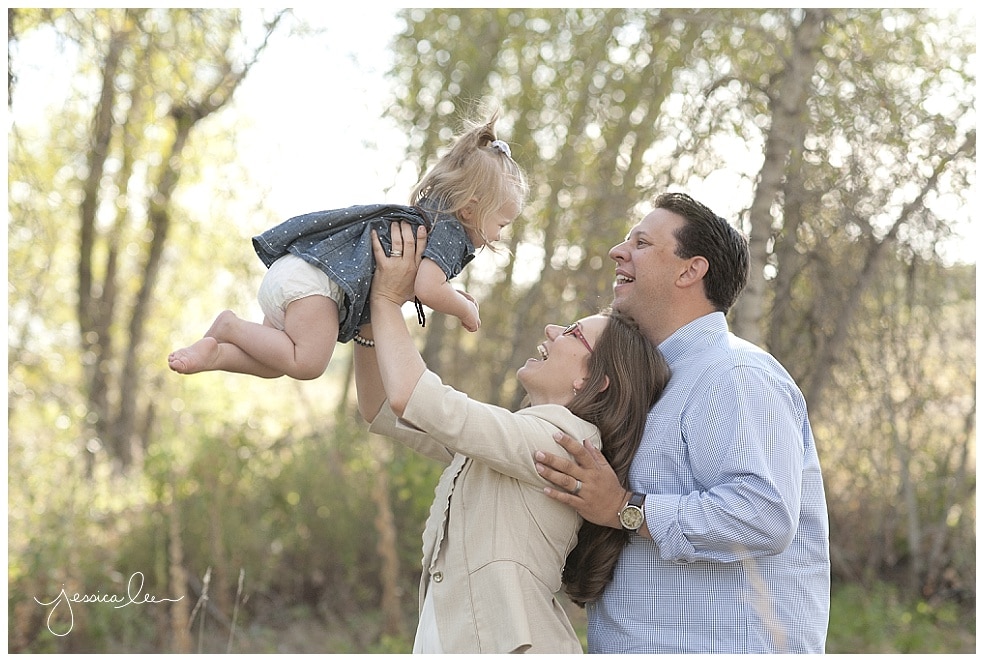 Longmont Family Photographer, family throwing baby in air