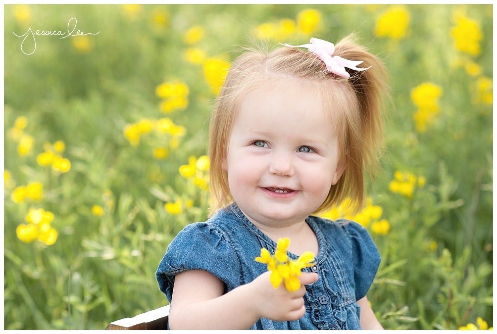 Louisville Colorado Family Photographer, little girl holding yellow flower