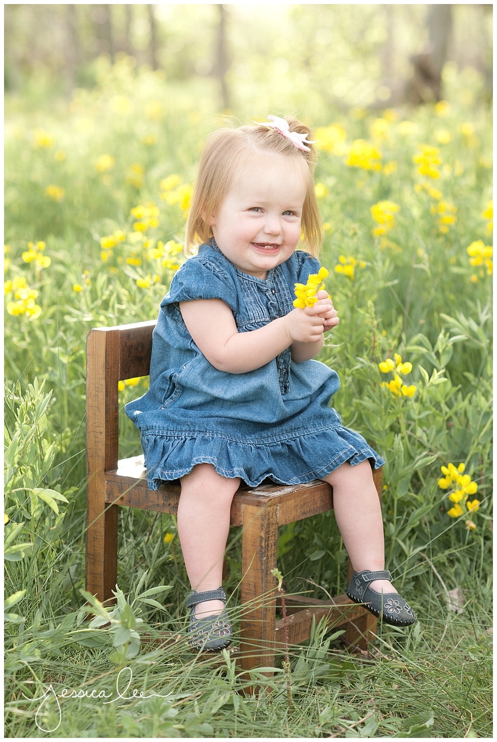 Louisville Colorado Family Photographer, little girl in chair smiling
