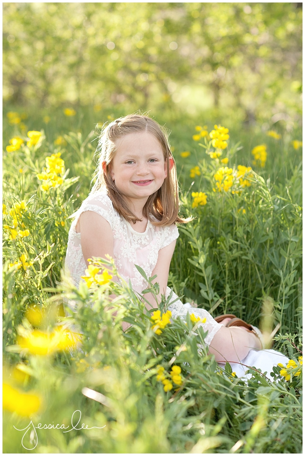 Louisville Colorado Family Photographer, little girl in yellow flowers