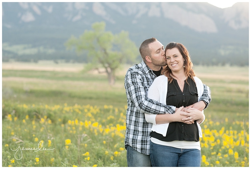 Denver Family Photographer, couple kissing with mountains