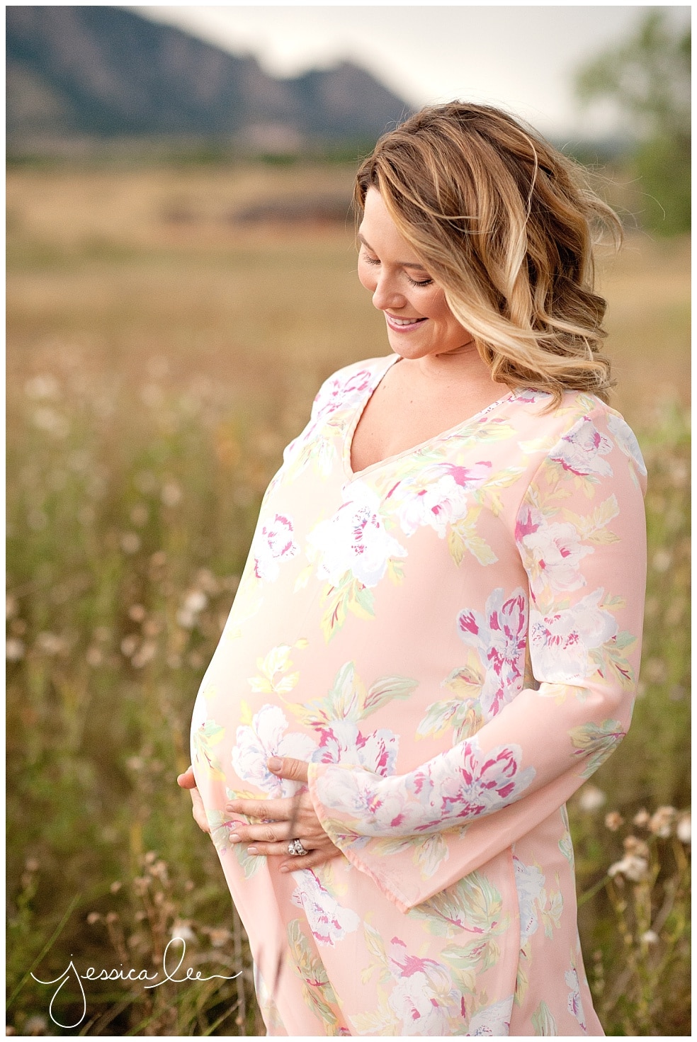 newborn baby photography erie, smiling maternity photo in boulder colorado