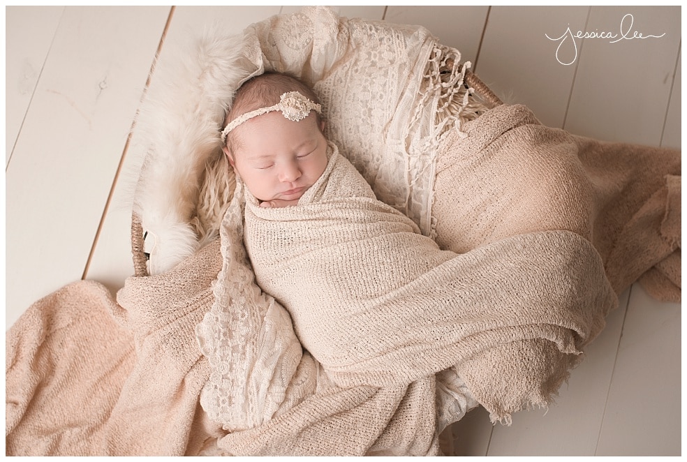 newborn wrapped in cream blanket, Boulder Baby Photographer
