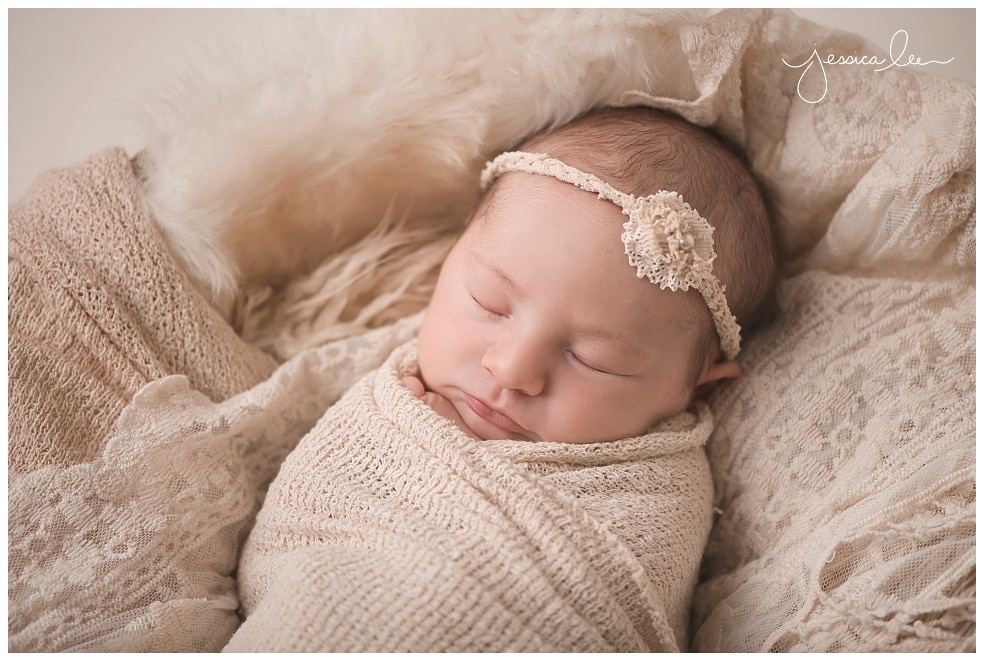 closeup photo of newborn wrapped in neutral colors, Boulder Baby Photographer,