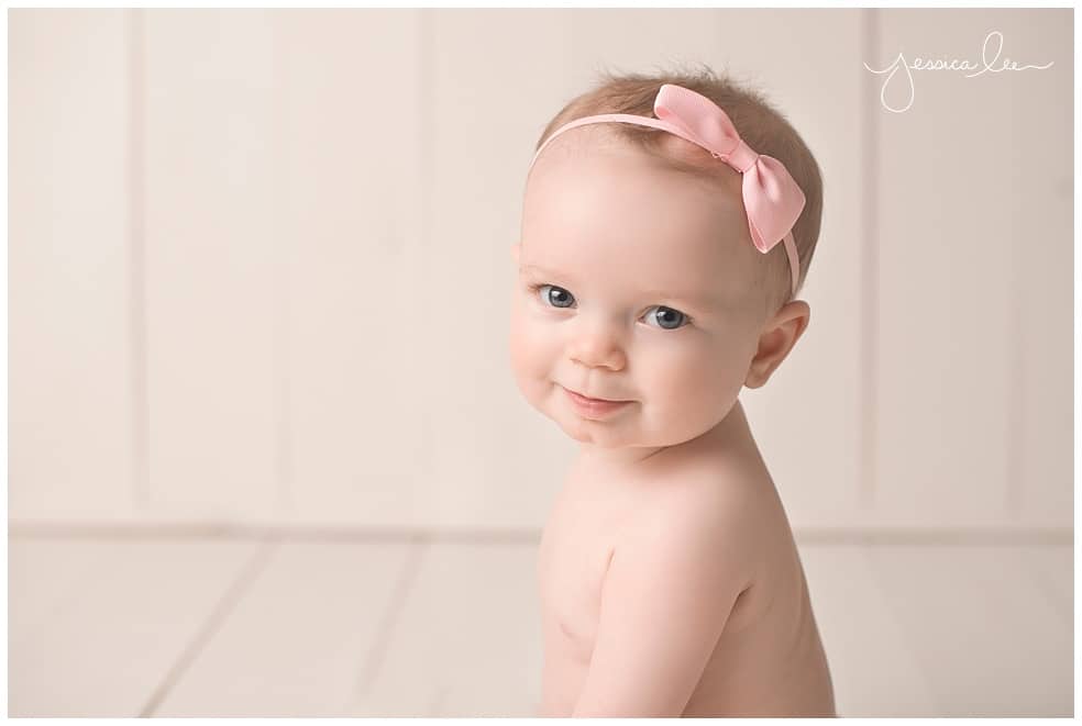 girl smiling at camera, 6 months old, Baby Photography Broomfield 