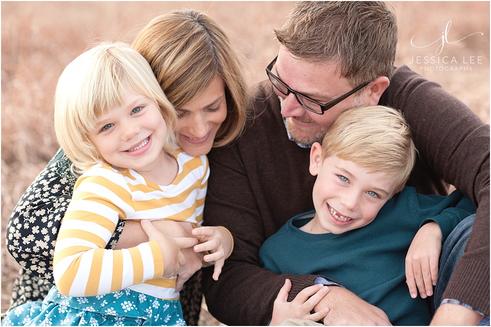 Louisville Family Photographer, four people snuggling together