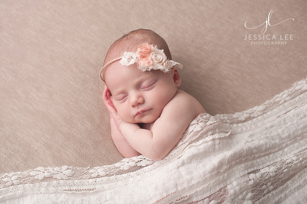 Broomfield Colorado Newborn Photographer, newborn with tan and white lace blanket