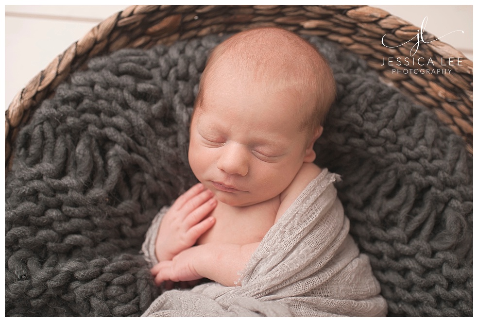 Newborn Photographer Broomfield, twin boy in blue basket