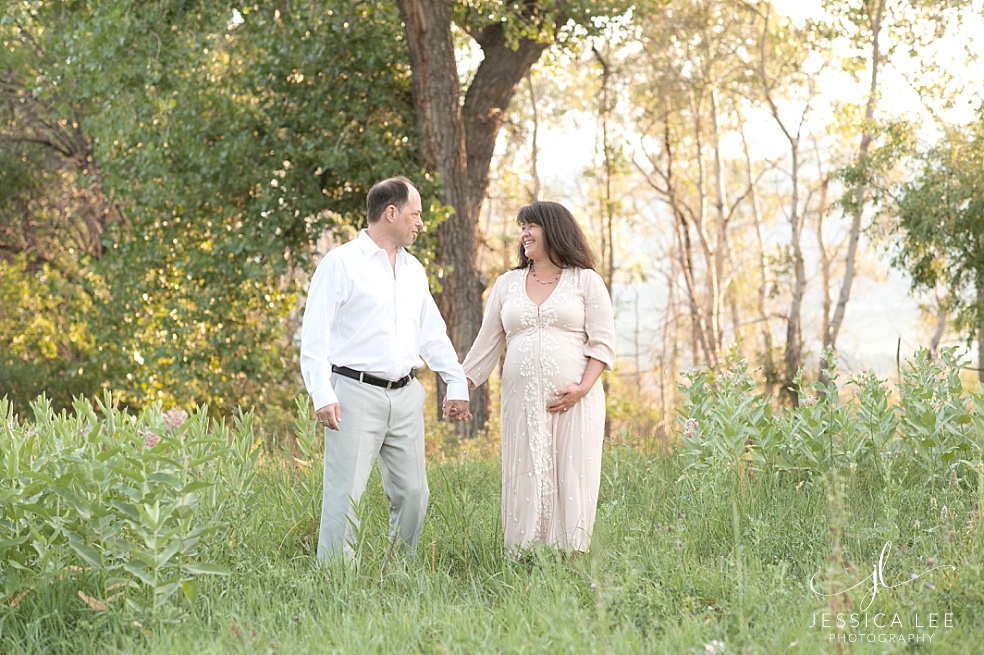 Mother walking with Father Maternity Session | Jessica Lee Photography