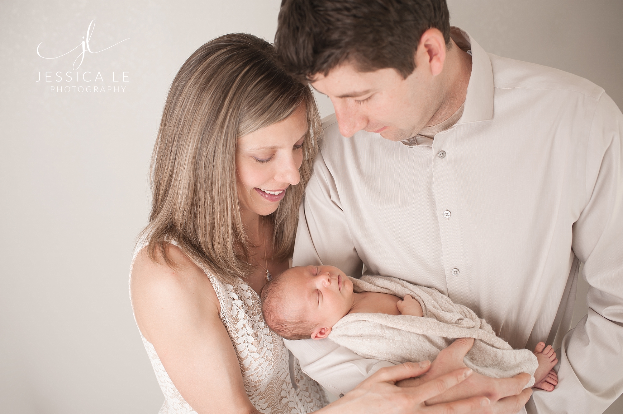 Ways to Help a New Mother | Jessica Lee Photography, Parents looking down at baby