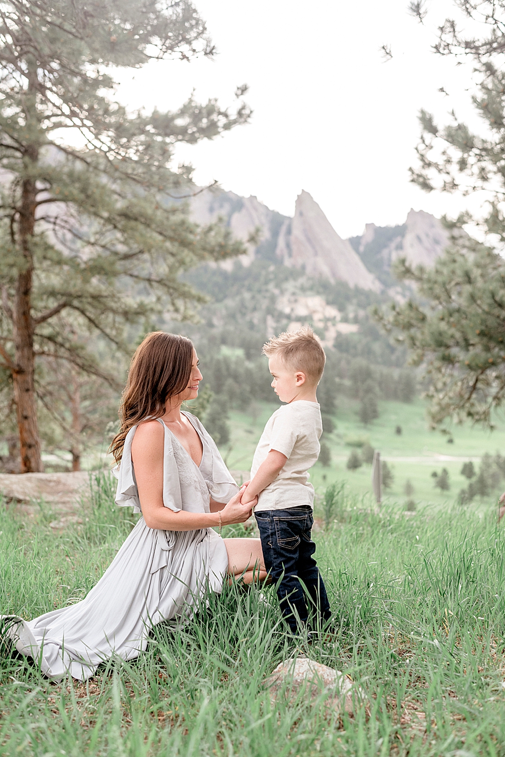 Mom and son interacting holding hands | Photo by Jessica Lee Photography