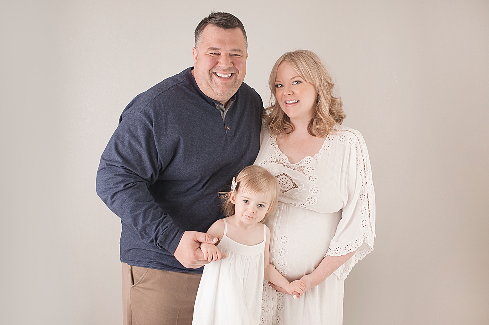 Family of three during maternity session | Photo by Jessica Lee Photography