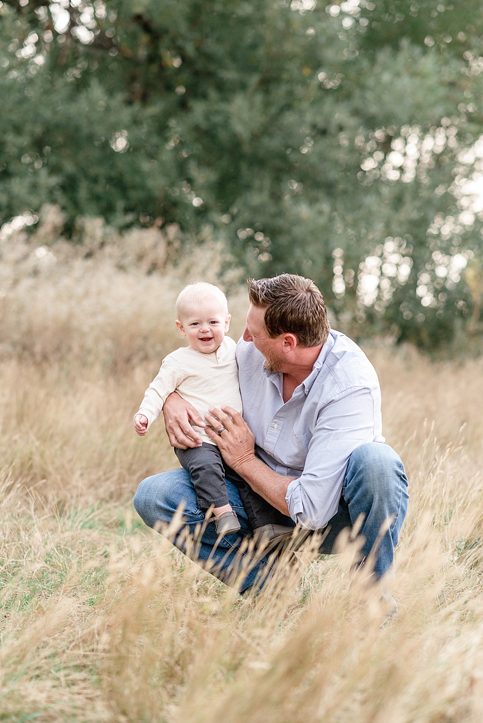 Dad laughing and playing with his toddler | Photo by Madison Alabama Baby Photographer Jessica Lee