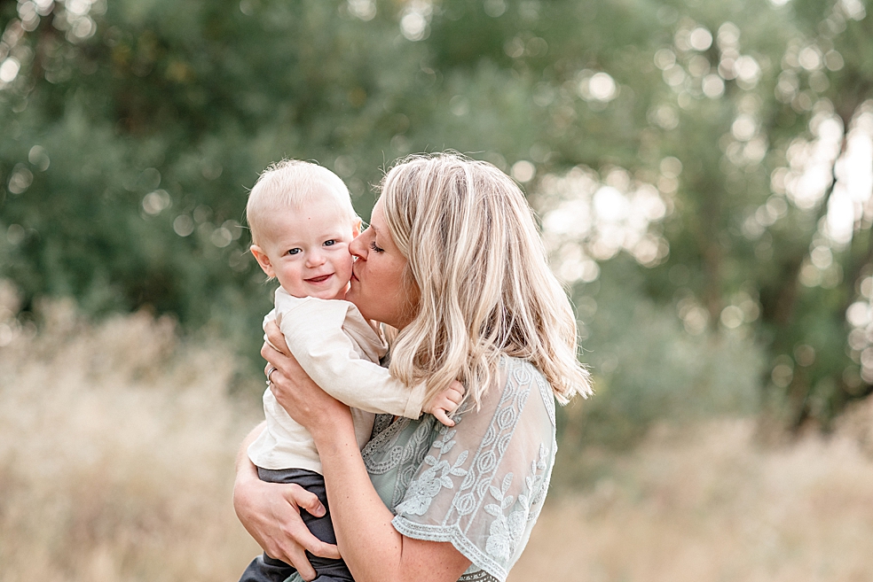 Mom kissing her toddler baby boy | Photo by Jessica Lee Photography 