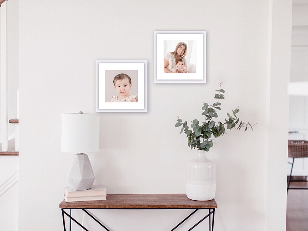 Gallery wall above an entryway table on a white wall | Jessica Lee Photography