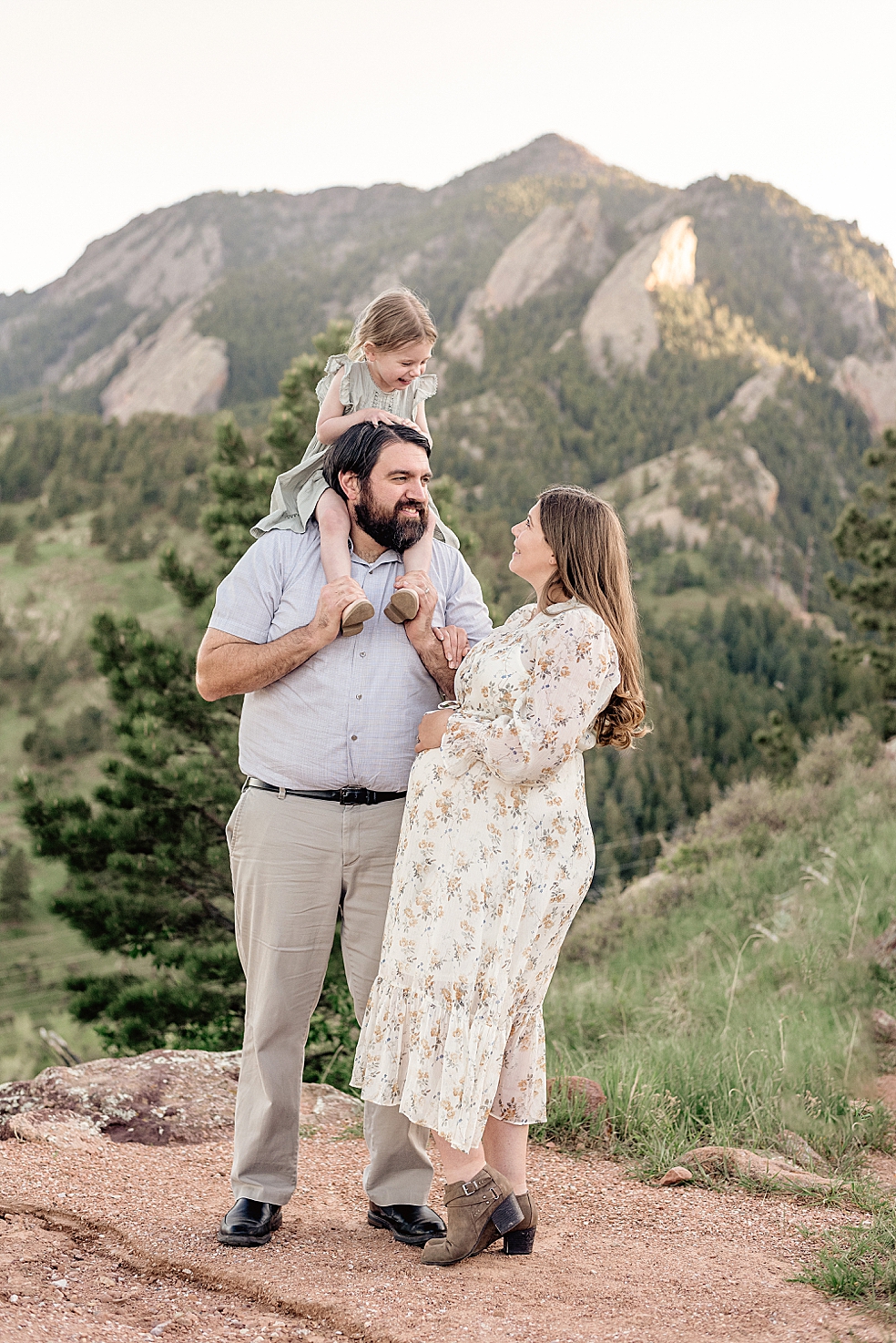 Family playing together during family photos | Photo by Meridianville Maternity Photographer Jessica Lee
