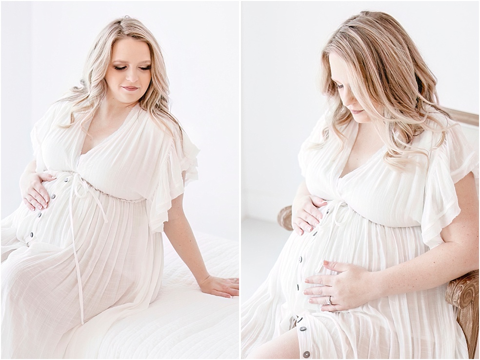 Woman in white maternity dress sitting down, Timeless Studio Maternity Session, Jessica Lee Photography